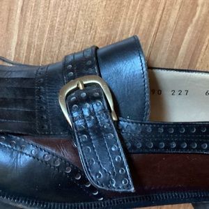 Ferragamo women’s buckle and fringe loafer, size 6.5